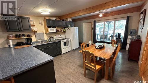 12 Oskunamoo Drive, Greenwater Provincial Park, SK - Indoor Photo Showing Kitchen With Double Sink