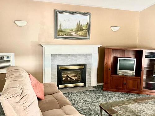 324 Basalt Drive, Logan Lake, BC - Indoor Photo Showing Living Room With Fireplace