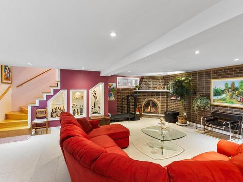 Family room - 486 Rue Donatien, Laval (Fabreville), QC - Indoor With Fireplace