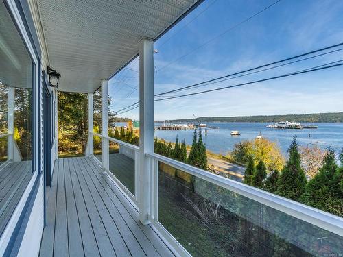 7403 Island Hwy South, Fanny Bay, BC - Outdoor With Body Of Water With Deck Patio Veranda With View With Exterior
