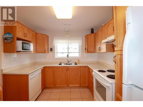 2265 Atkinson Street Unit# 407, Penticton, BC - Indoor Photo Showing Kitchen With Double Sink