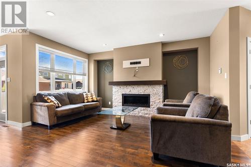 3530 Green Creek Road, Regina, SK - Indoor Photo Showing Living Room With Fireplace