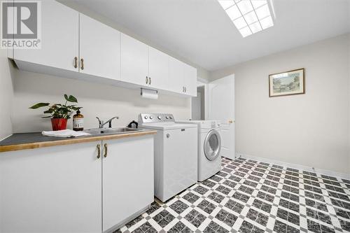Laundry room separates main home, for in law area - 8027 Parkway Road, Metcalfe, ON - Indoor Photo Showing Laundry Room