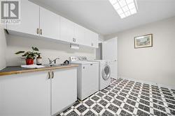 Laundry room separates main home, for in law area - 