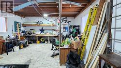 Another view of the garage/shop...you should see it for yourself to appreciate the options. - 
