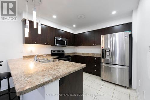 51 Colonel Frank Ching Crescent, Brampton, ON - Indoor Photo Showing Kitchen With Double Sink