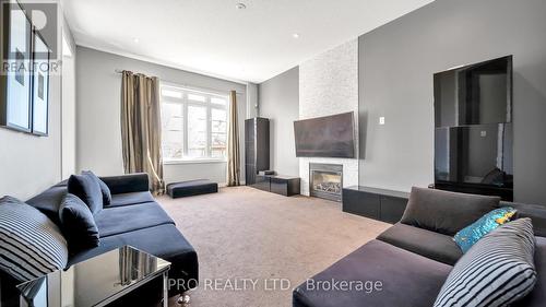 4 Quatro Cres, Brampton, ON - Indoor Photo Showing Living Room With Fireplace