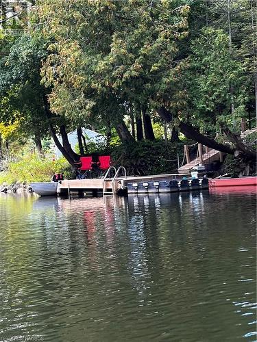 Dock and Floating Dock on the property - 78 Indian Trail, Sauble Beach, ON - Outdoor With Body Of Water