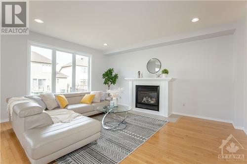 4 Keighley Circle, Ottawa, ON - Indoor Photo Showing Living Room With Fireplace