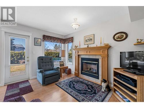 7604 Sage Drive, Coldstream, BC - Indoor Photo Showing Living Room With Fireplace