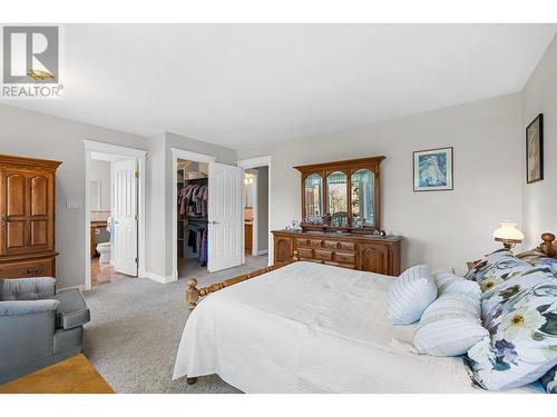 7604 Sage Drive, Coldstream, BC - Indoor Photo Showing Bedroom