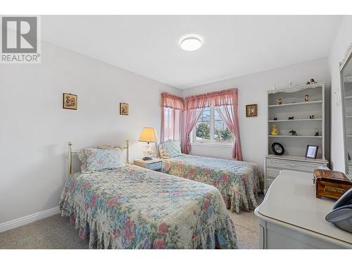 7604 Sage Drive, Coldstream, BC - Indoor Photo Showing Bedroom