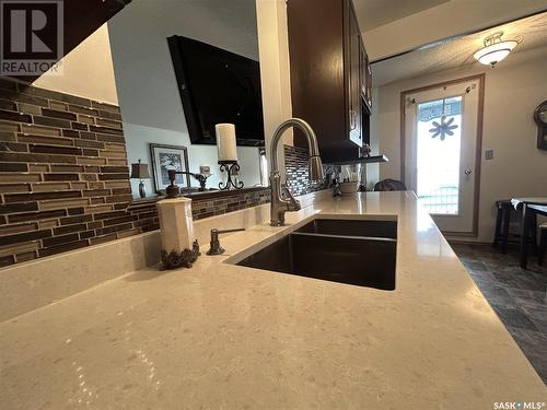 203 408 Heritage Drive, Estevan, SK - Indoor Photo Showing Kitchen With Double Sink