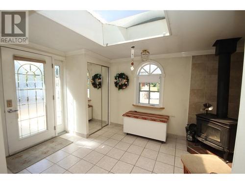 945 Kingfisher Place, Oliver, BC - Indoor Photo Showing Other Room With Fireplace