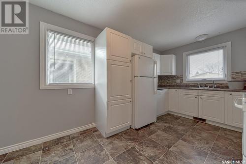 7301-7303 Bowman Avenue, Regina, SK - Indoor Photo Showing Kitchen With Double Sink