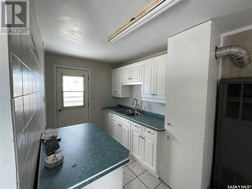 12 Railway Street S, Springside, SK - Indoor Photo Showing Kitchen With Double Sink