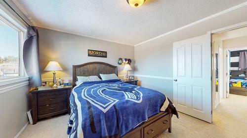 2213 3Rd Street N, Cranbrook, BC - Indoor Photo Showing Bedroom