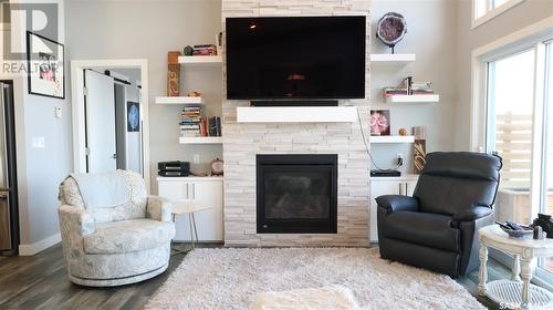 700 Saskatoon Drive, Katepwa Beach, SK - Indoor Photo Showing Living Room With Fireplace