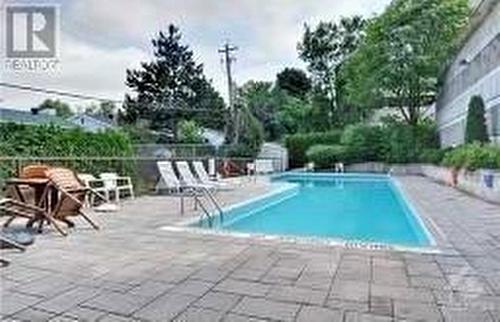 2019 Carling Avenue Unit#305, Ottawa, ON - Outdoor With In Ground Pool With Backyard