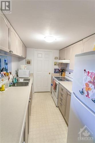 2019 Carling Avenue Unit#305, Ottawa, ON - Indoor Photo Showing Kitchen With Double Sink