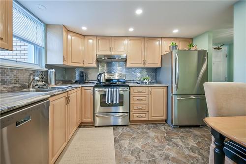 19 Lake Avenue S|Unit #202, Stoney Creek, ON - Indoor Photo Showing Kitchen With Double Sink