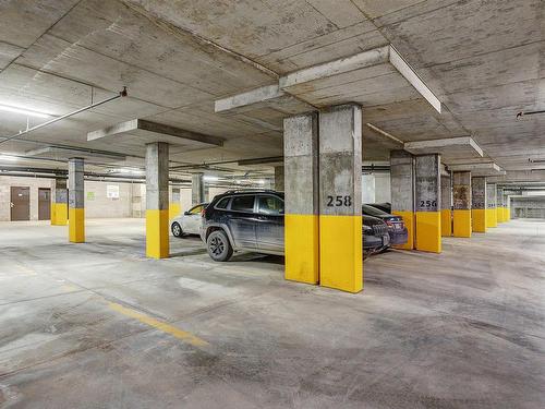 Parking - 505-3647 Av. Jean-Béraud, Laval (Chomedey), QC - Indoor Photo Showing Garage