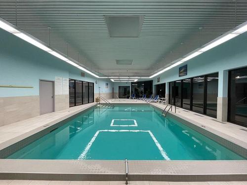 Piscine - 204-21 Ch. Du Bord-Du-Lac-Lakeshore, Pointe-Claire, QC - Indoor Photo Showing Other Room With In Ground Pool