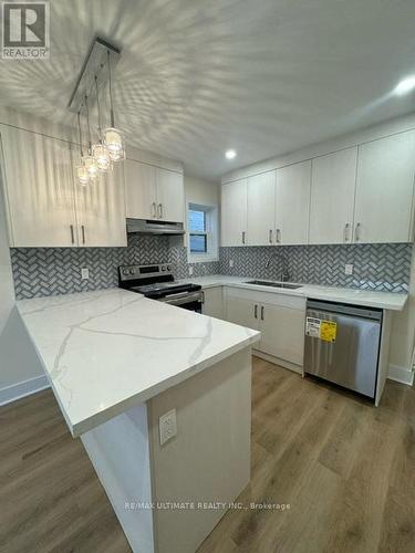 Main Fl - 102 Robina Avenue, Toronto, ON - Indoor Photo Showing Kitchen With Upgraded Kitchen