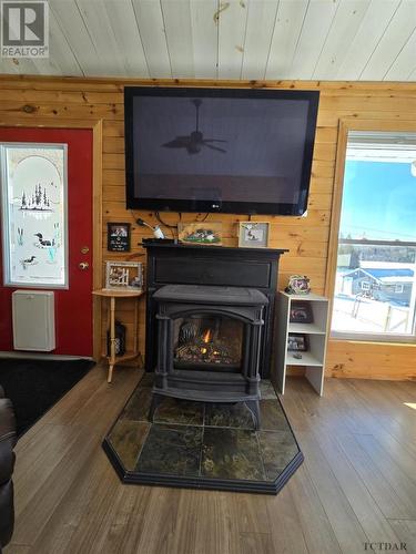 48 Mowat St, Latchford, ON - Indoor Photo Showing Living Room With Fireplace