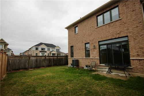 Fully fenced backyard - 57 Thompson Road, Caledonia, ON - Outdoor With Exterior