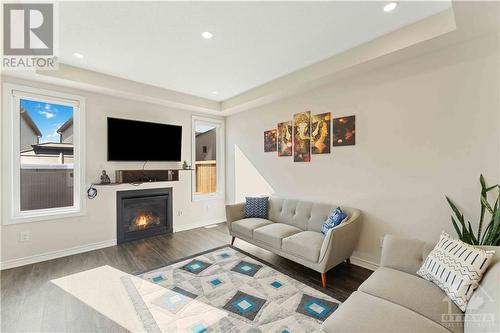 552 Cope Drive, Ottawa, ON - Indoor Photo Showing Living Room With Fireplace