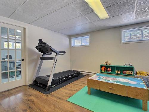 Family room - 777 Rue Poitras, Magog, QC - Indoor Photo Showing Gym Room