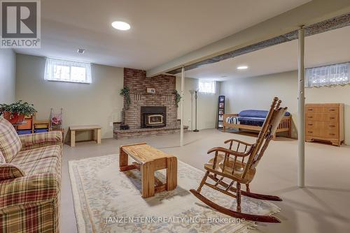 57604 Tunnel Line, Bayham, ON - Indoor Photo Showing Basement With Fireplace
