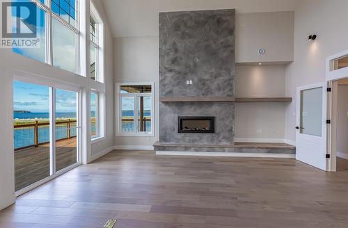 7 Commodore Place, Conception Bay South, NL - Indoor Photo Showing Living Room With Fireplace