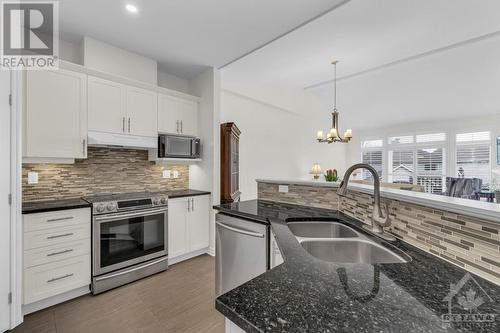 106 Passageway Private, Kanata, ON - Indoor Photo Showing Kitchen With Stainless Steel Kitchen With Double Sink With Upgraded Kitchen