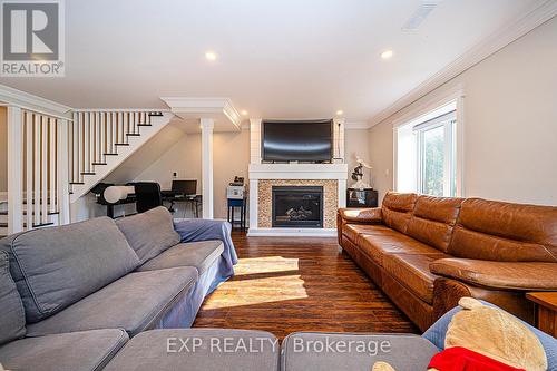 390 Mill Street, Essa, ON - Indoor Photo Showing Living Room With Fireplace