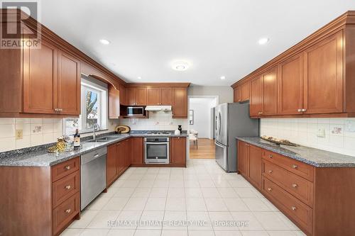 22 Chelmsford Ave, Toronto, ON - Indoor Photo Showing Kitchen With Double Sink
