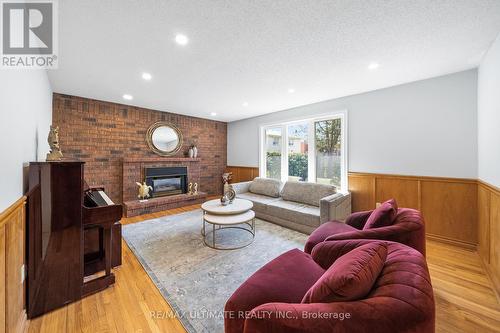 22 Chelmsford Ave, Toronto, ON - Indoor Photo Showing Living Room With Fireplace
