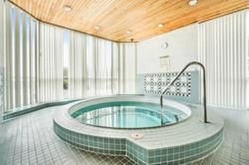 1109-880 Dundas St W, Mississauga, ON - Indoor Photo Showing Other Room With In Ground Pool