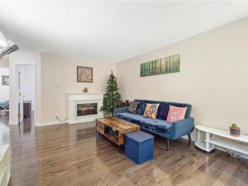 829 Harewood Mines Rd, Nanaimo, BC - Indoor Photo Showing Living Room With Fireplace