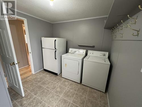 5412 51 Street, Fort Nelson, BC - Indoor Photo Showing Laundry Room