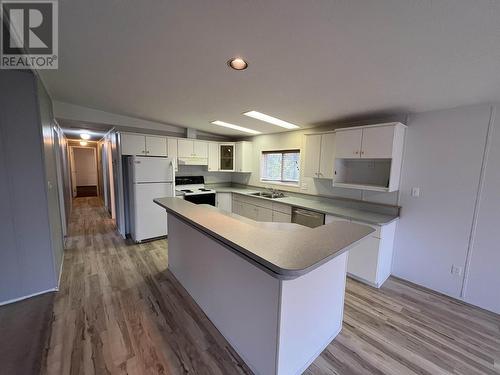 5412 51 Street, Fort Nelson, BC - Indoor Photo Showing Kitchen With Double Sink