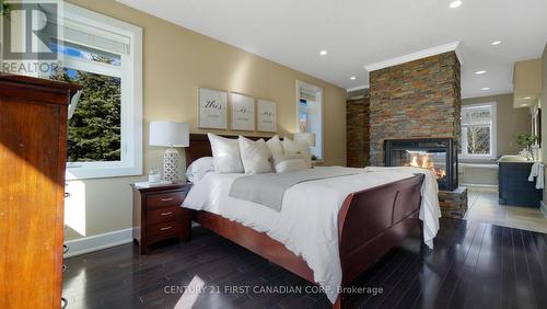 1659 Hamilton Rd, London, ON - Indoor Photo Showing Bedroom With Fireplace
