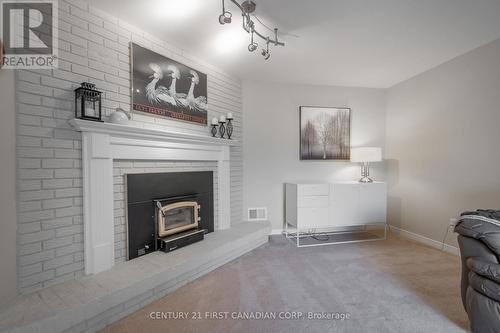 1445 Norman Ave, London, ON - Indoor Photo Showing Other Room With Fireplace