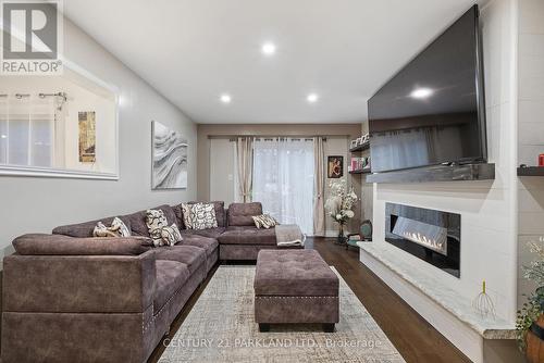 87 Bonacres Ave, Toronto, ON - Indoor Photo Showing Living Room With Fireplace