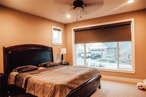 1807 Capistrano Peaks Crescent, Kelowna, BC - Indoor Photo Showing Bedroom