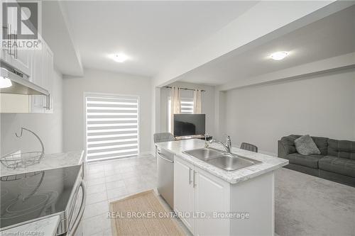 #53 -520 Grey St, Brantford, ON - Indoor Photo Showing Kitchen With Double Sink
