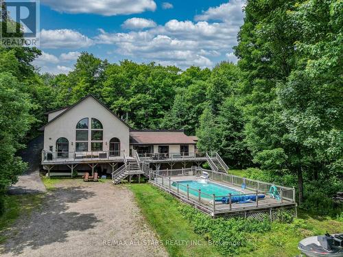 1013 Merrick Drive, Bracebridge, ON - Outdoor With In Ground Pool With Deck Patio Veranda