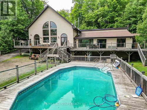 1013 Merrick Drive, Bracebridge, ON - Outdoor With In Ground Pool With Deck Patio Veranda