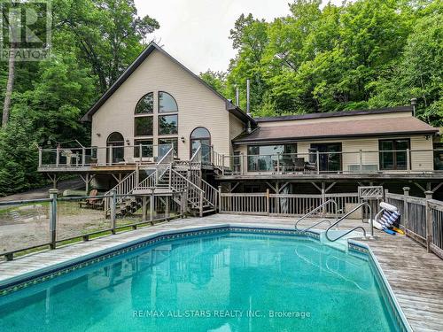 1013 Merrick Drive, Bracebridge, ON - Outdoor With In Ground Pool With Deck Patio Veranda